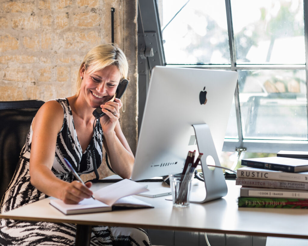 Concierge on phone to client